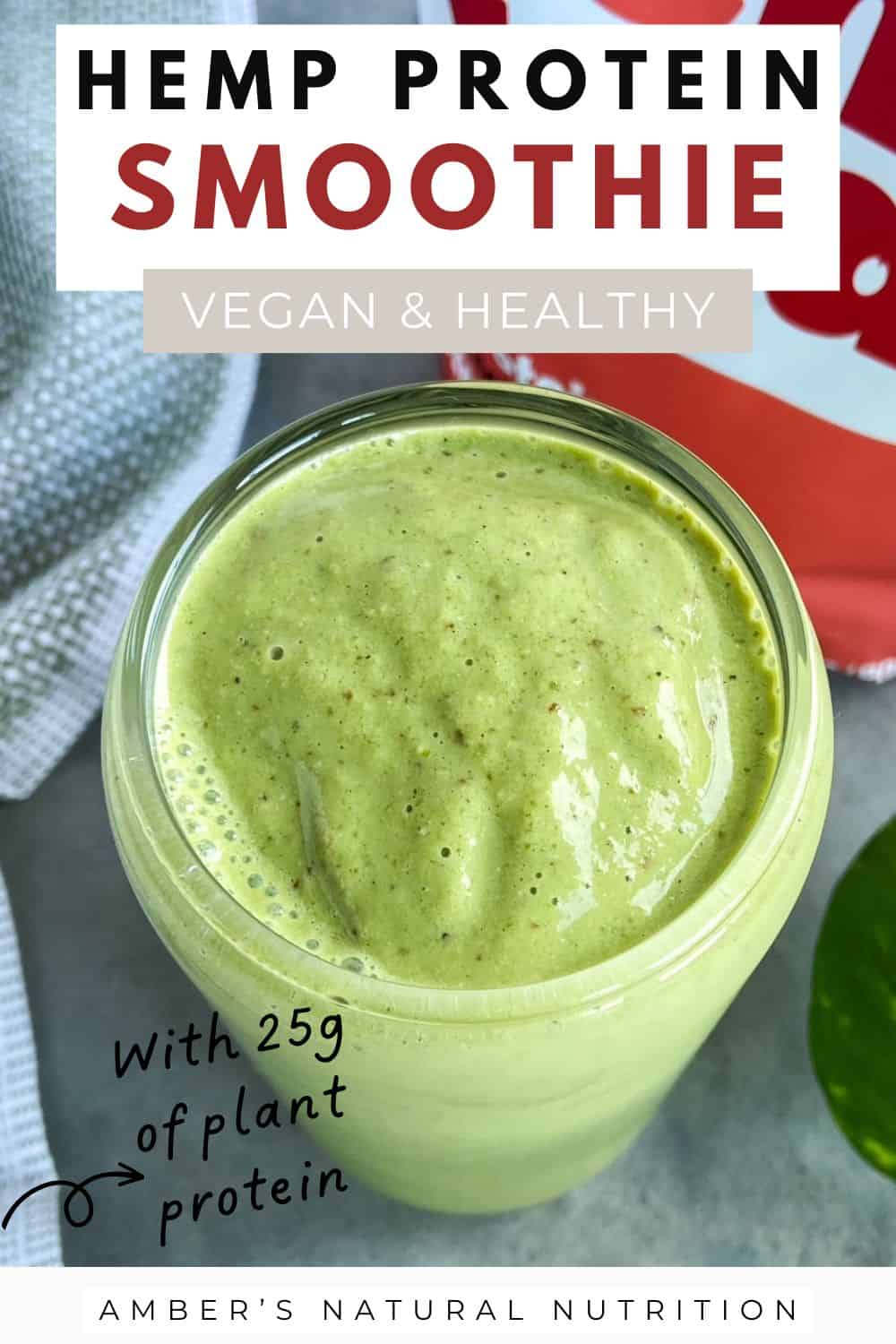 A green protein smoothie in a glass with text overlay reading hemp protein smoothie, vegan and healthy, with 25g of plant protein.