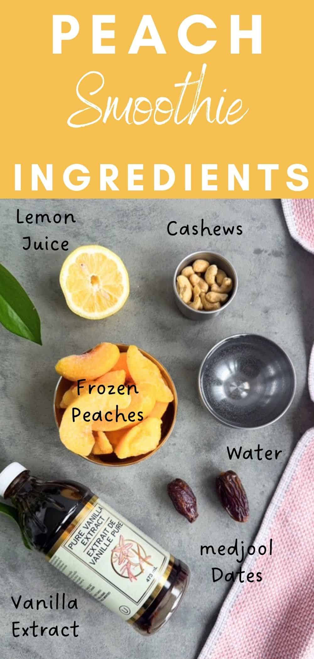Flat lay of peach smoothie ingredients including frozen peaches, cashews, Medjool dates, lemon, vanilla extract, and water on a grey surface.