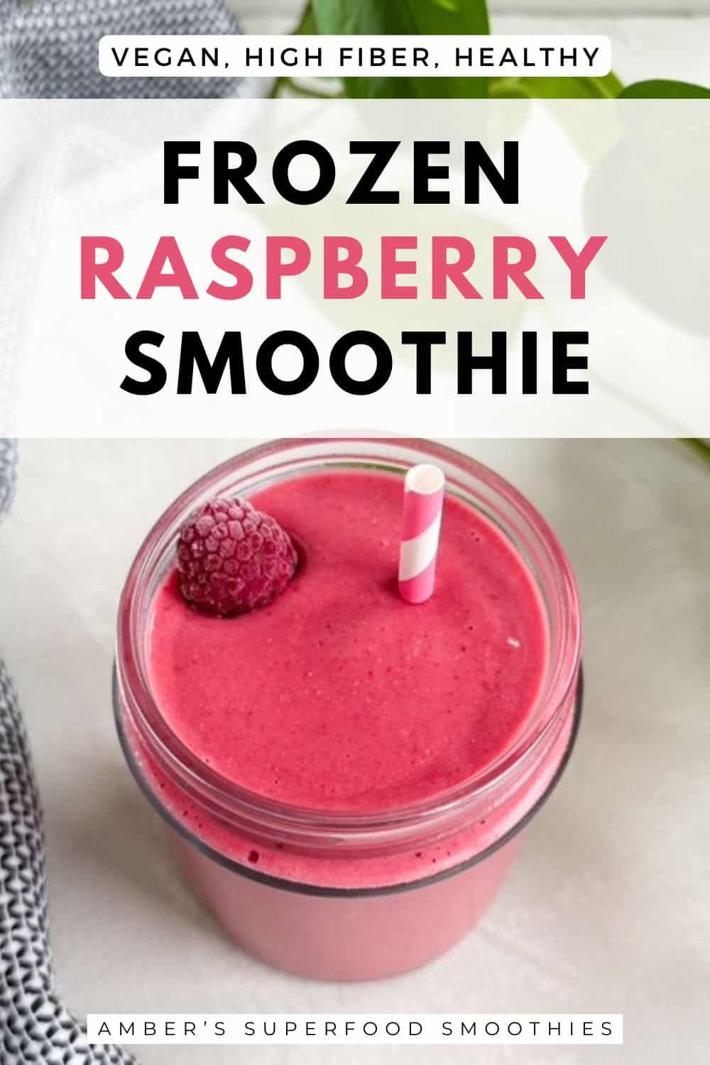 A jar of frozen raspberry smoothie topped with a raspberry and straw, with text overlay on the image.